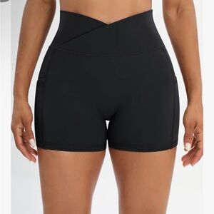 Iserkafe spandex shorts w Cross waist + side pockets.Womens small in black